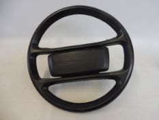 A 1980s Porsche 944 Turbo steering wheel.