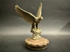 A car accessory mascot in the form of a bird of prey, mounted on a radiator cap, approx. 5 1/2"