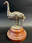 A car accessory mascot in the form of an ostrich or emu, display base mounted, approx. 6 1/2" high