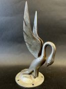 An unusual Art Deco car accessory mascot in the form of a stylised swan(?), display base mounted,