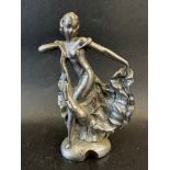 A car mascot in the form of a flamenco dancer, approx. 6 1/4" tall.