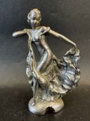 A car mascot in the form of a flamenco dancer, approx. 6 1/4" tall.