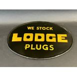 A Lodge Plugs oval showcard, in excellent condition, believed new old stock, 12 1/2 x 8 3/4".