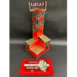 A Lucas Cyclealities cardboard display stand plus a driving lamp advertisement.