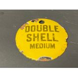 A small circular enamel brand tag for Double Shell Medium, 2 3/4" diameter.