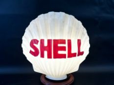 A Continental fat Shell glass petrol pump globe, in good condition bar a chip to neck.