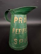 A Pratts Perfection Spirit half gallon measure with embossed lettering.