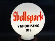 A Shellspark Vaporising Oil glass petrol pump globe, chipped to base.