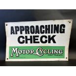 A cardboard information sign bearing Motor Cycling magazine advertising, 20 x 12 1/2".