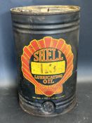 A rare and early Shell Lubricating Oil five gallon drum in very good condition.