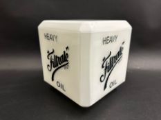 A reproduction milk glass square lamp shade bearing advertising for Filtrate Oil.