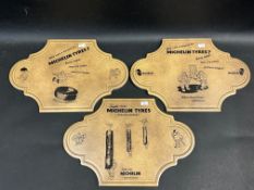 Three Michelin branded tiles, stamped Made in Italy.