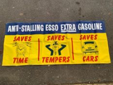 An Esso Extra Gasoline pictorial advertising banner, 79 x 33 1/2".