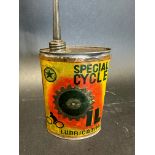 A Special Cycle Lubricating Oil oval tin with paper label.