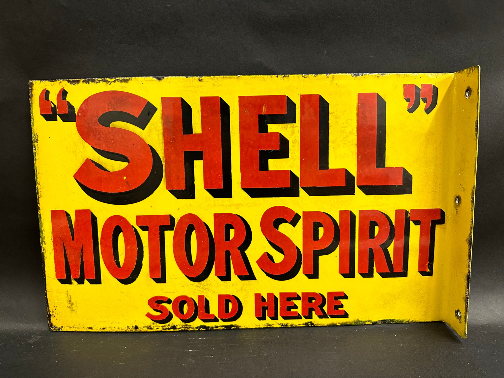 A Shell Motor Spirit Sold Here double sided enamel sign by Bruton of Edmonton, with replacement