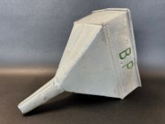 A BP embossed rectangular funnel.