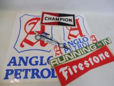 A Champion applique patch for the back of overalls, various Anglo Petrol stickers etc.
