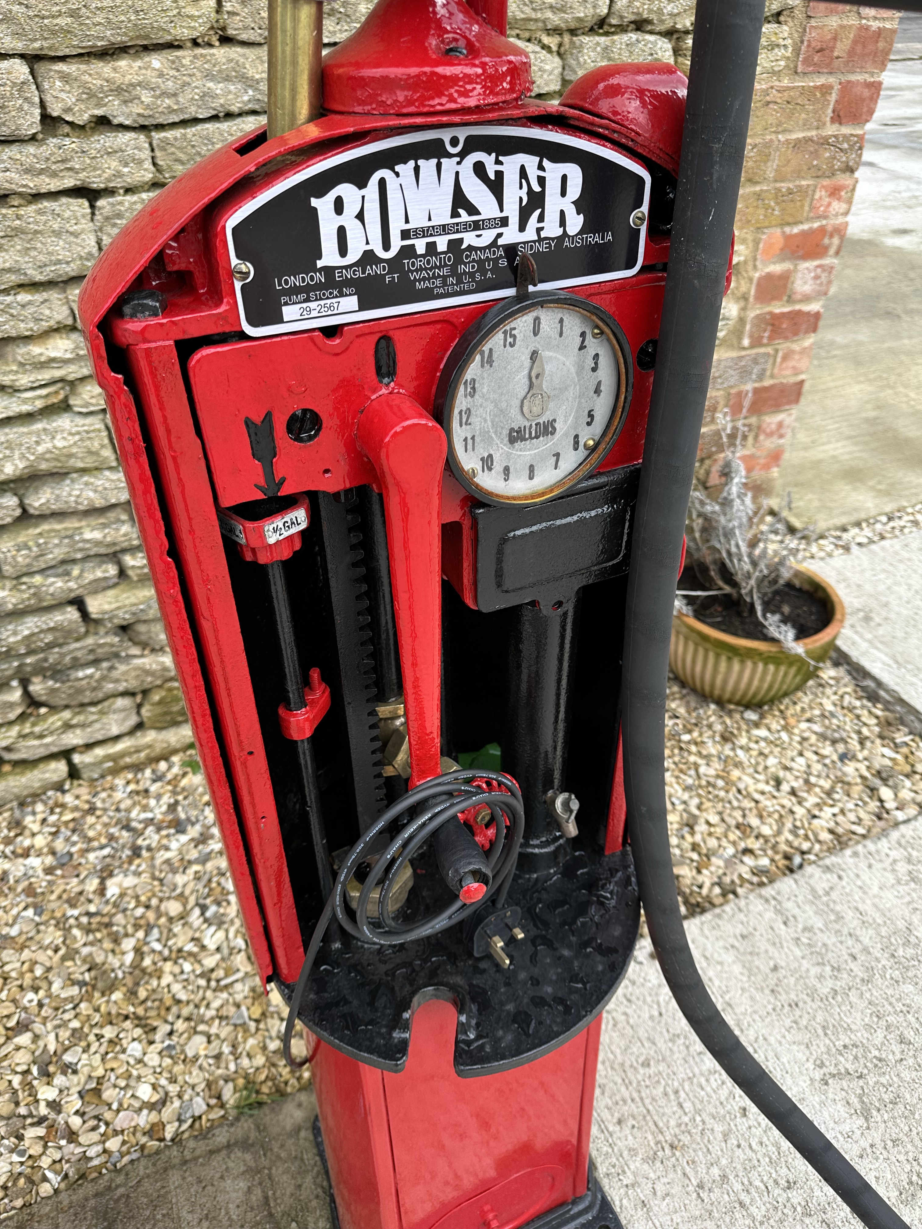 A Bowser hand-operated petrol pump, restored, with hose, nozzle and reproduction plastic petrol pump - Image 2 of 6