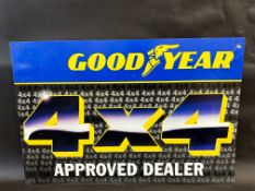 A Goodyear 4x4 Approved Dealer tin advertising sign, 35 1/2 x 23 1/2".