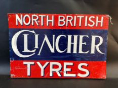 A North British Clincher Tyres tin advertising sign mounted on board, 24 x 16".
