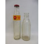 A Shell Company of New Zealand glass oil bottle and one other.