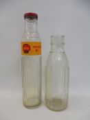 A Shell Company of New Zealand glass oil bottle and one other.