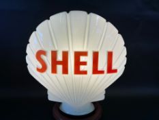 A Shell glass petrol pump globe by Hailware, fully stamped underneath and dated September 1971.