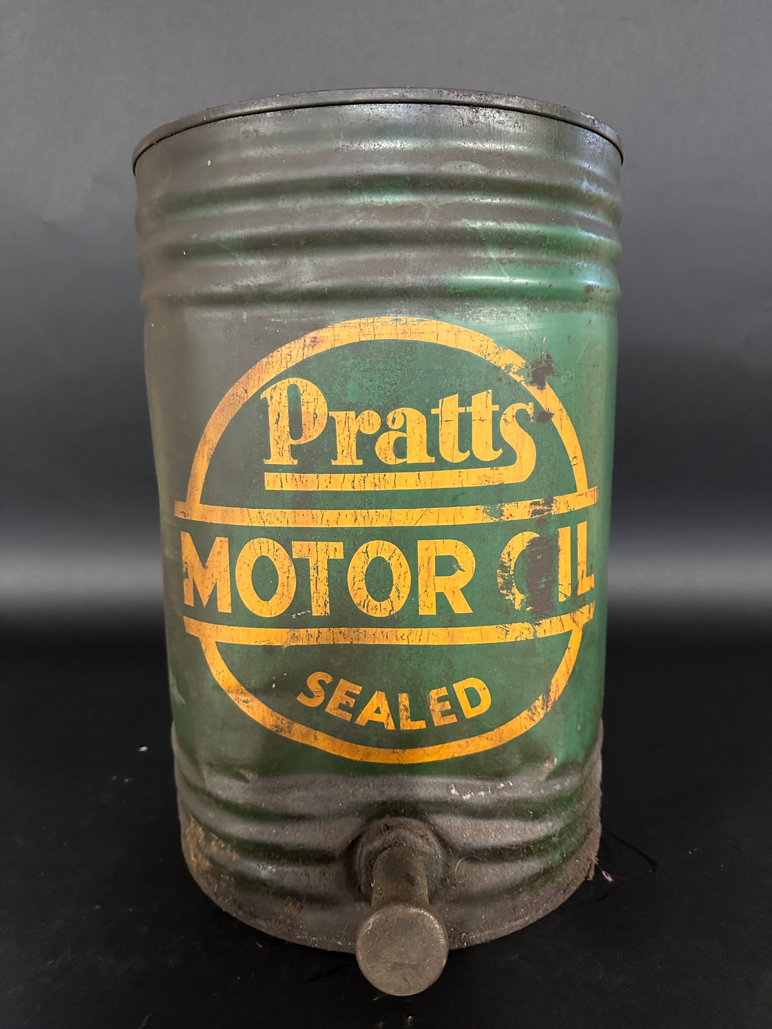 A Pratts Sealed Motor Oil ribbed five gallon drum, with tap.