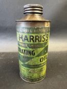 A Harris's Penetrating Oil cylindrical tin with paper label.