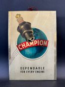 A Champion spark plugs pictorial tin showcard, 8 x 11 1/2".