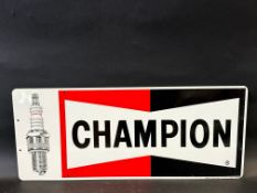 A Champion Spark Plugs new old stock aluminium advertising sign, 23 x 9 1/2".