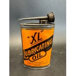 An XL Lubricating Oil oval tin.