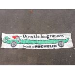 A Michelin 'Drive The Long Runner' advertising banner, 94 x 20 1/2".