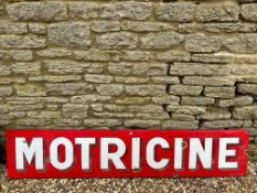 A Continental enamel sign advertising Motricine, 77 x 16 1/2".