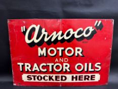 A rare Arnoco Motor and Tractor Oils tin advertising sign, 27 x 18".