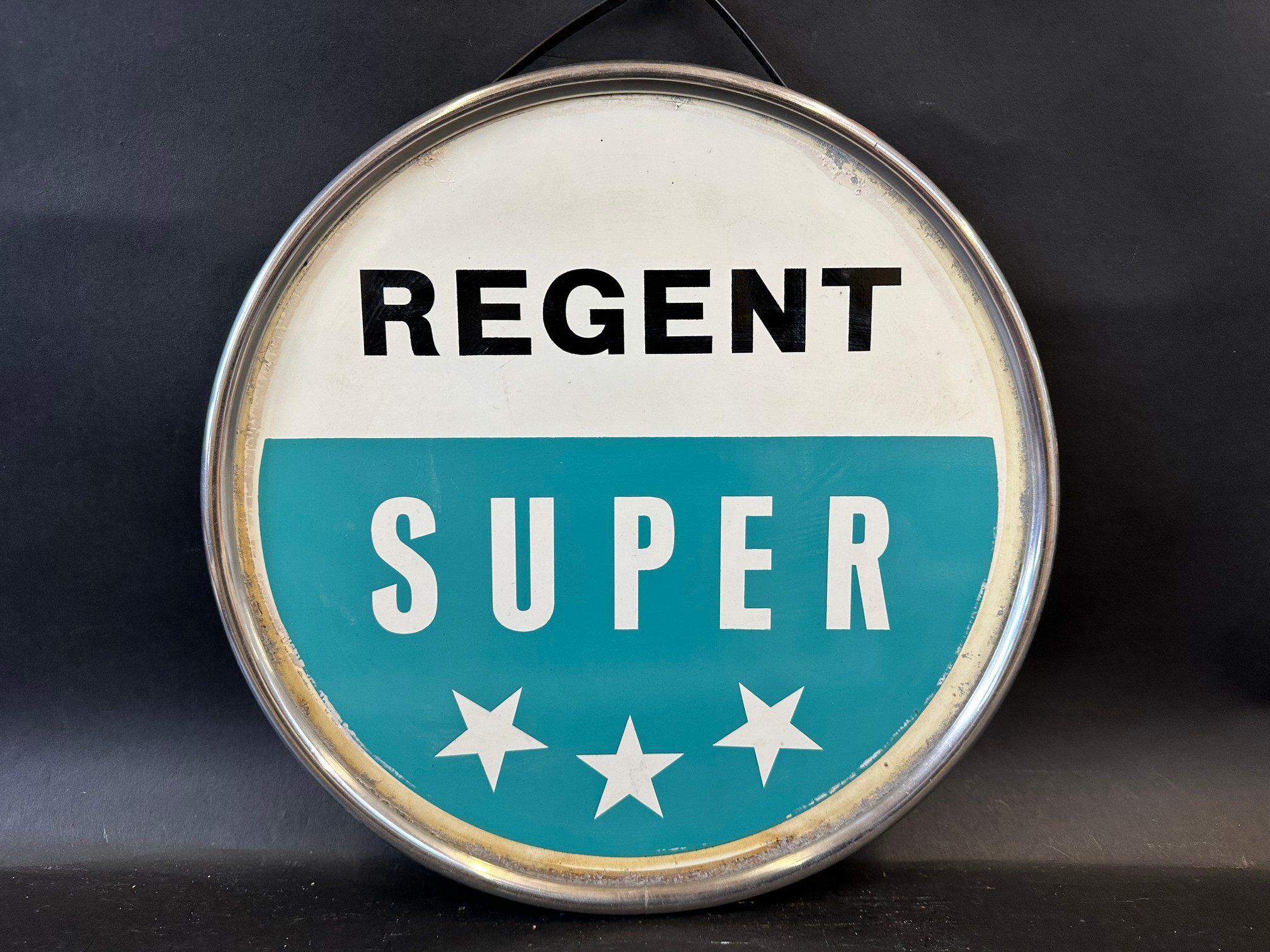 A Regent Super circular petrol pump sign, 14 1/2" diameter.