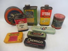 A quantity of assorted small puncture repair outfit tins, oil cans etc.