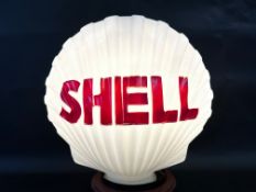 A Continental fat Shell glass petrol pump globe, in good condition.