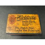 A Holdtite Patches rectangular tin.