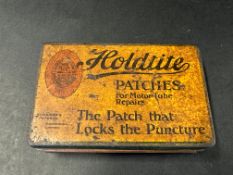 A Holdtite Patches rectangular tin.