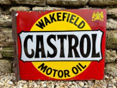 A Wakefield Castrol Motor Oil double sided enamel sign with hanging flange by Bruton of Palmers