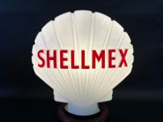 A Shellmex glass petrol pump globe by Hailware, bright lettering but damaged neck.
