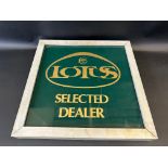 A Lotus double sided dealership sign.