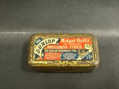 A Dunlop Midget Outfit tin.