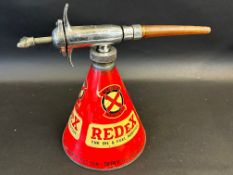 A Redex additive conical dispensing gun in good condition.
