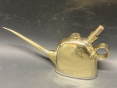A Lucas No.40 polished brass oiler.