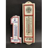 Two small thermometers bearing advertising for L.S. Gas.