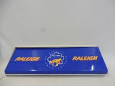 A Raleigh Genuine Parts and Accessories illuminated lightbox, 39 1/2 x 14".