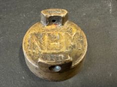 An unusual two gallon petrol can cap bearing the initials NBM (National Benzole Mixture).