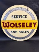 A Wolseley Service and Sales circular double sided aluminium advertising sign by Franco, 36"